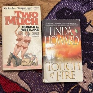 Two Paperback Books: 'Two Much' and 'Touch of Fire'